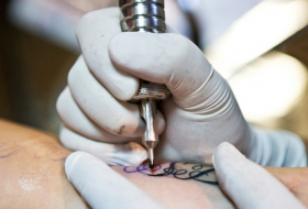 Tattoos help Israelis scarred by attacks and war